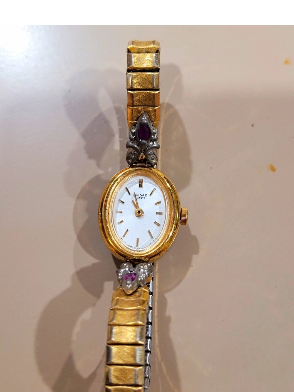 Pulsar Gold Tone Women's Watch with Purple Gem Accents